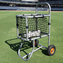 baseball ball cart in center field grass with shadow and baseball inside