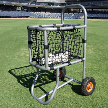 baseball ball cart in center field grass with shadow and baseball inside